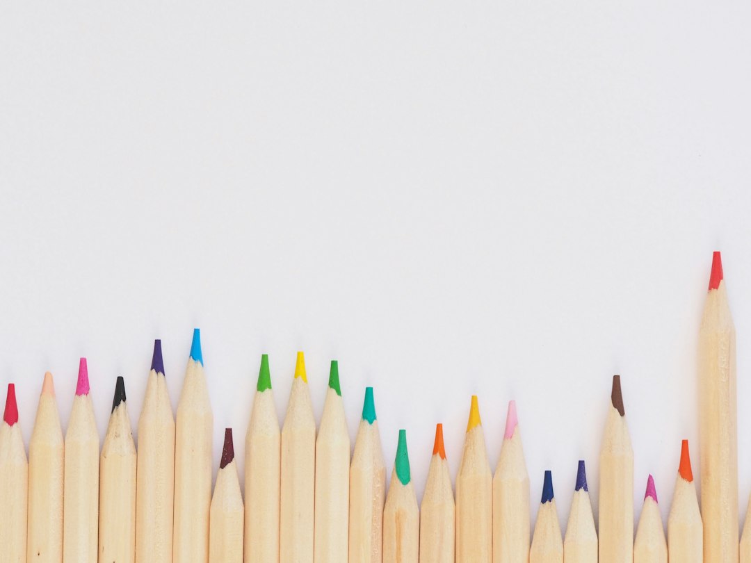 Colored pencils and creative coloring book illustration for self-publishing guide; photo by Jess Bailey
